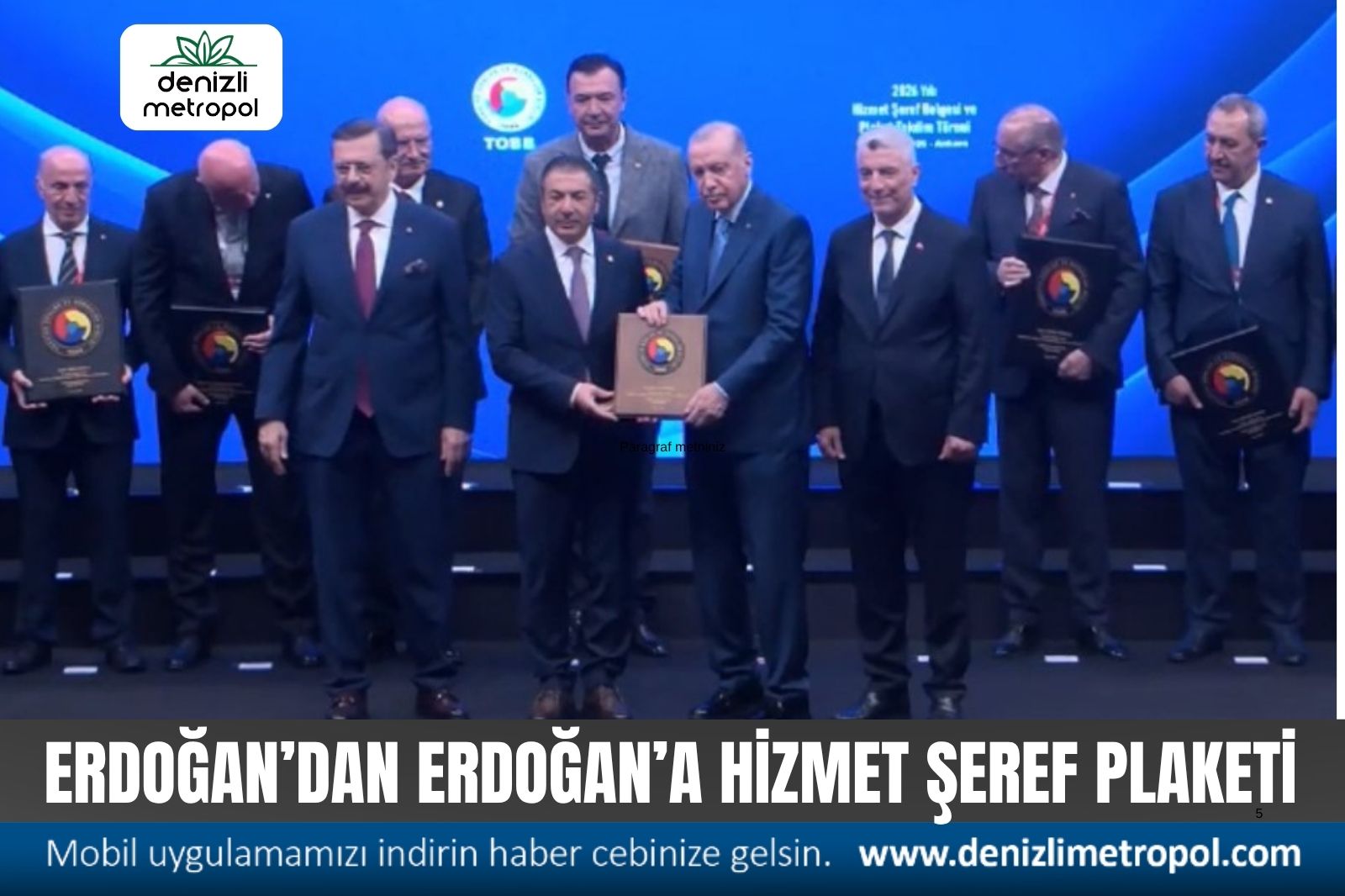 ERDOĞAN’DAN UĞUR ERDOĞAN’A HİZMET ŞEREF PLAKETİ